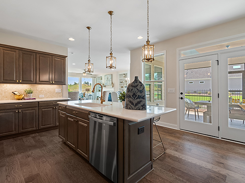 Open Kitchens make entertaining a breeze with family and friends.>